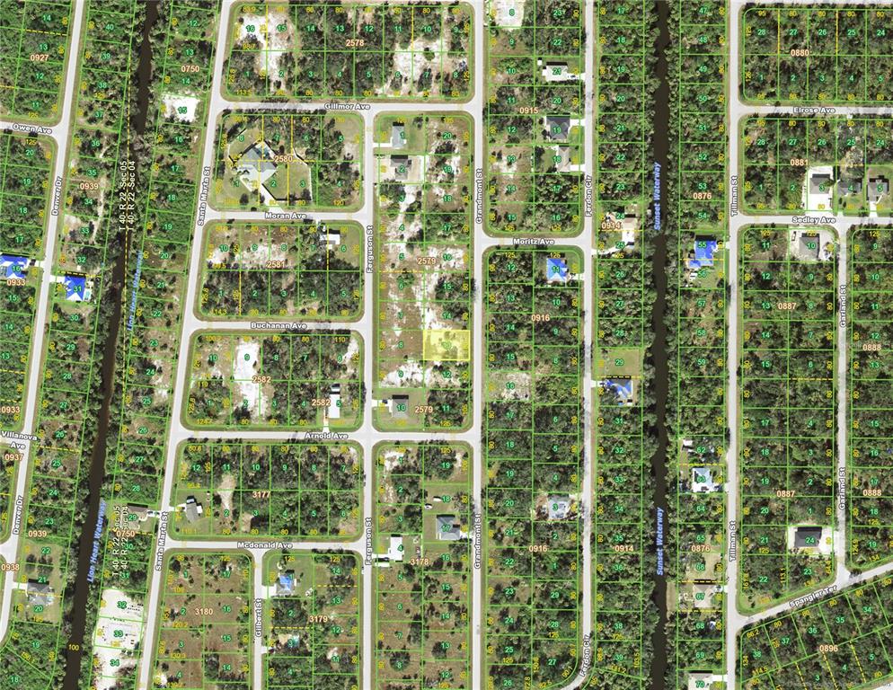This is a satellite map showing residential lots, streets, and waterways in a suburban area — 187 GRANDMONT STREET, PORT CHARLOTTE, FL