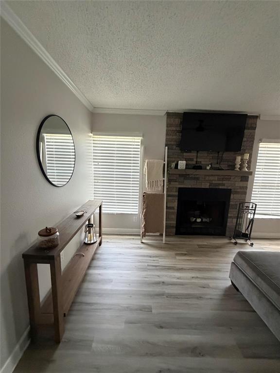 A dining area with a small table and stools sits adjacent to an open kitchen — 3024 BONAVENTURE CIRCLE UNIT 204, PALM HARBOR, FL