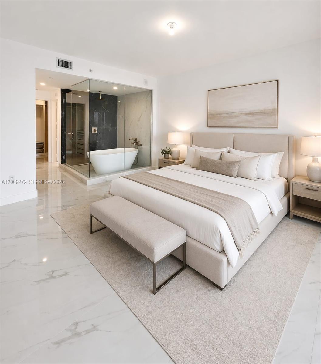 A modern bedroom features a glass-enclosed bathroom with a soaking tub and marble flooring — 700 NE 24 St # 3903, Miami FL 33137, MIAMI, FL