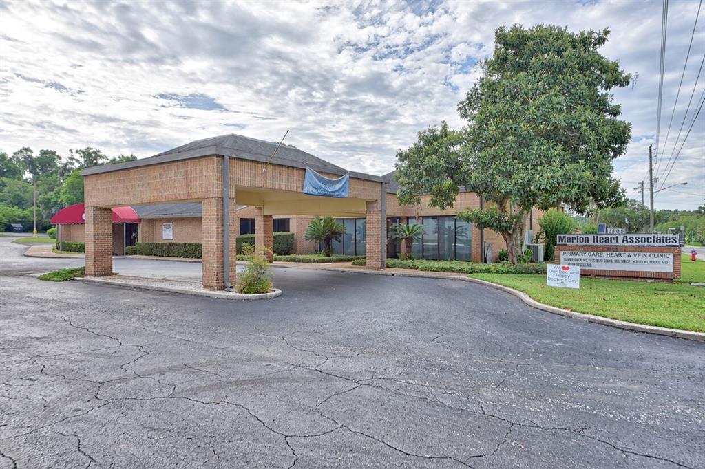 A brick medical office building features a large covered entrance and a prominent roadside sign — 1805 SE LAKE WEIR AVENUE UNIT 3, OCALA, FL