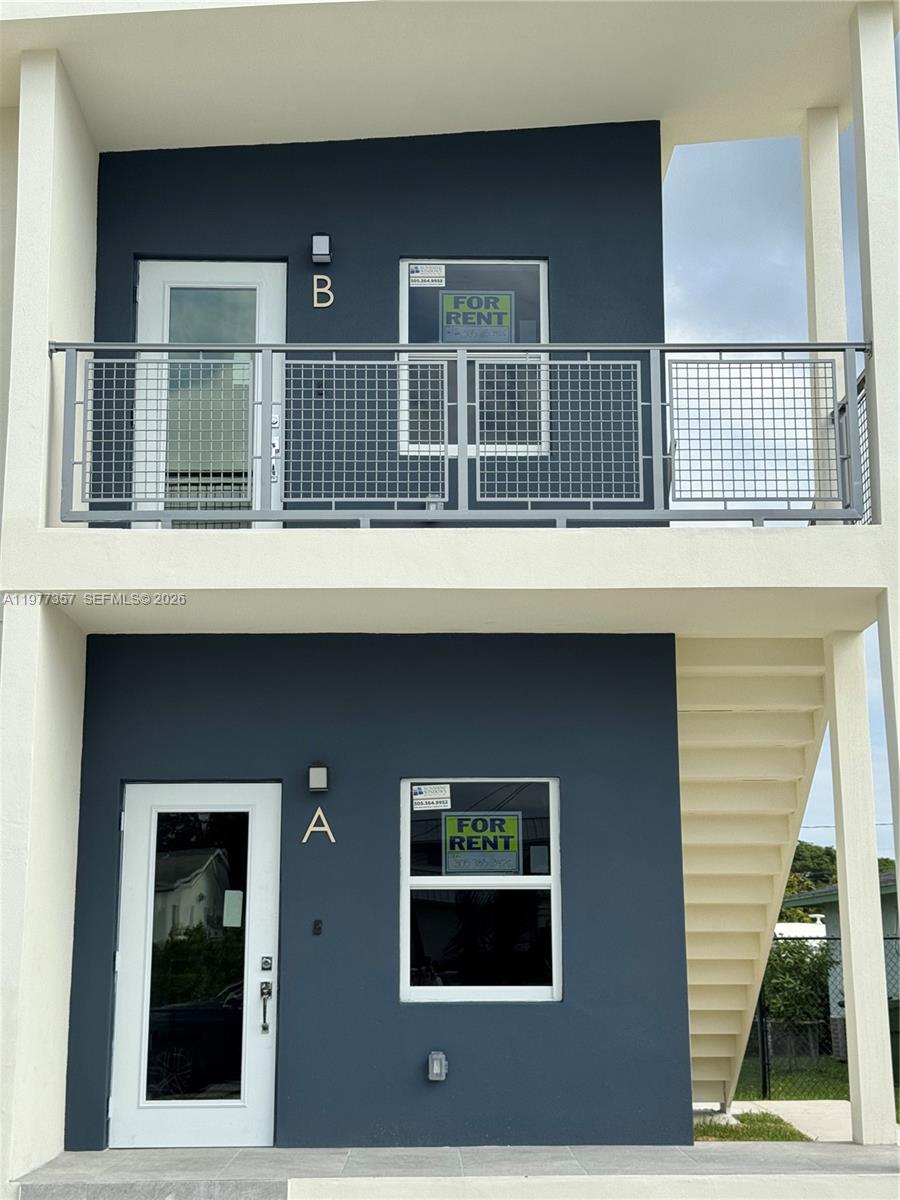 A two-story building exterior features two units labeled A and B with stairs — 526 NW 6th # A, Hallandale Beach FL 33009, HALLANDALE BEACH, FL