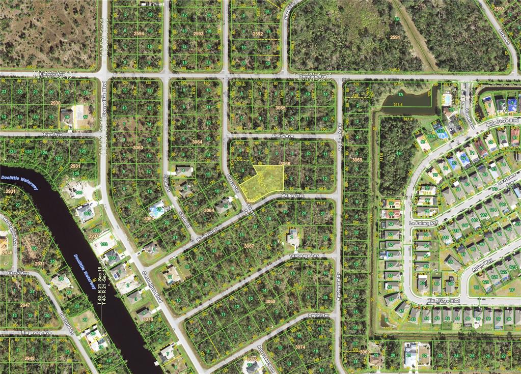 This is an aerial map showing a vacant lot highlighted in yellow within a residential area — 15090 WALKER & FRISCO (LOTS 3+4) TERRACE, PORT CHARLOTTE, FL