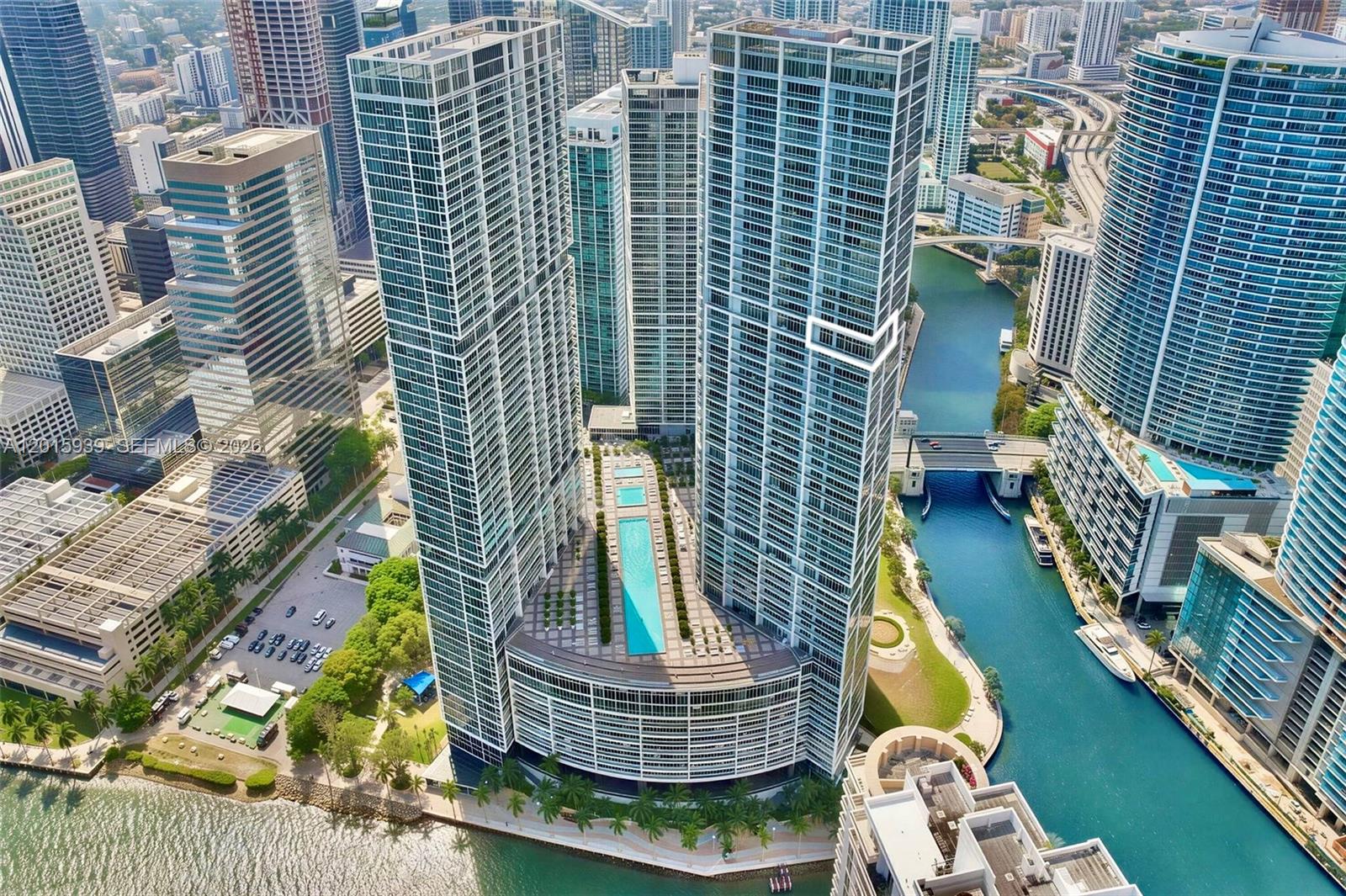 Aerial view of two modern high-rise residential towers connected by a pool deck in Miami — 465 Brickell Ave # 4101, Miami FL 33131, MIAMI, FL