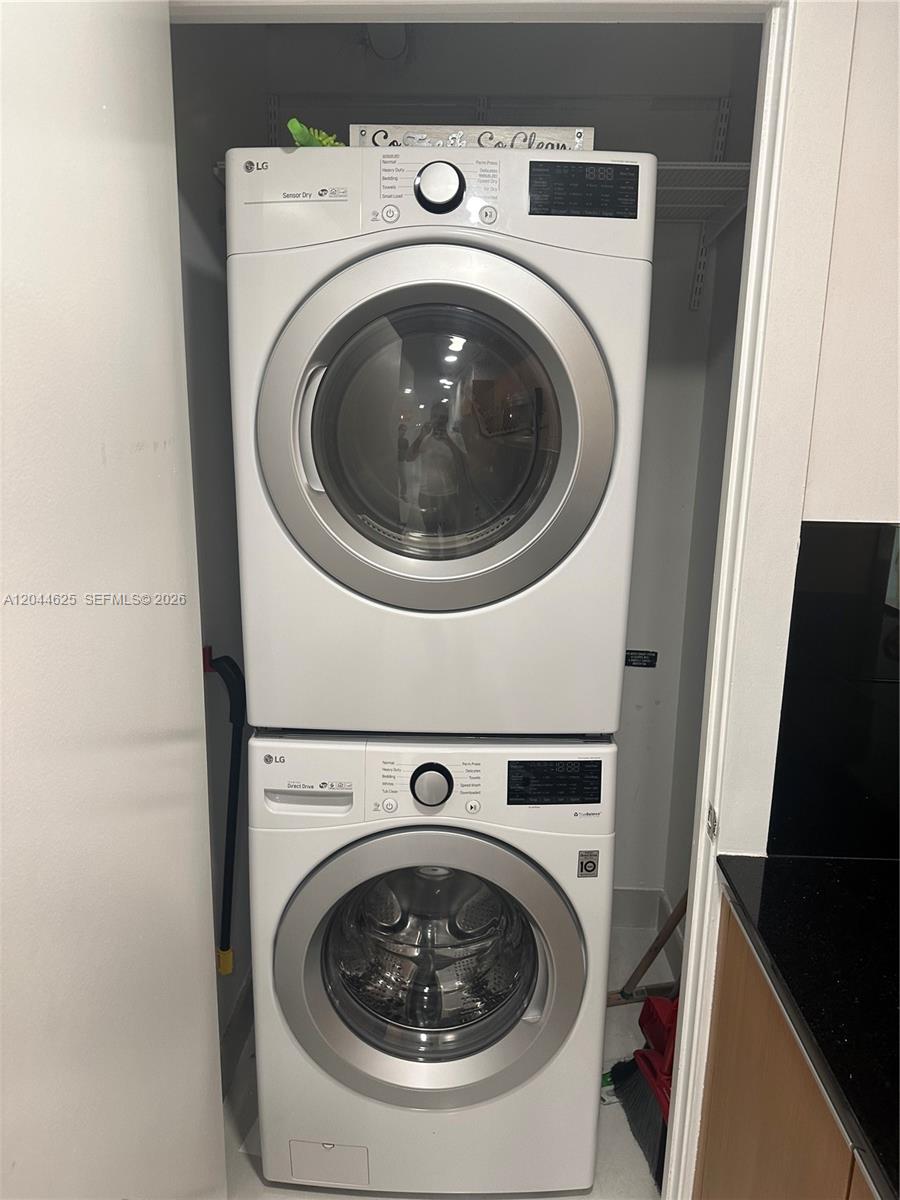 A stacked LG washer and dryer unit is installed inside a small laundry closet — 1060 Brickell Ave # 2505, Miami FL 33131, MIAMI, FL