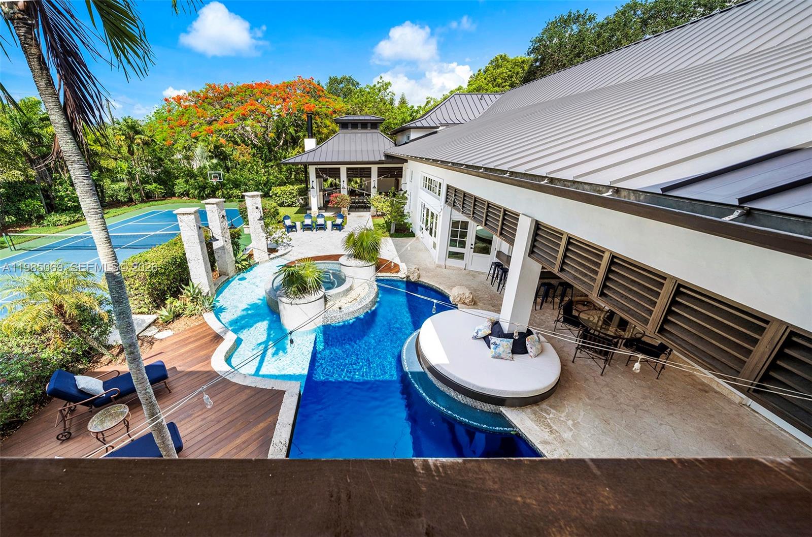 Balcony view from primary bedroom — 6700 SW 132nd St, Pinecrest FL 33156, PINECREST, FL