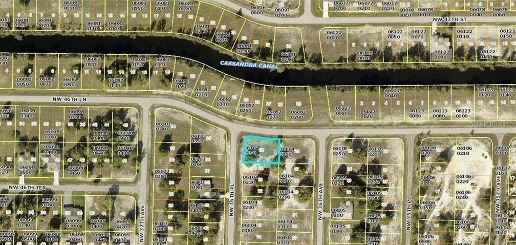 This is an aerial map showing residential lots and a canal in a neighborhood — 4621 NW 36TH PLACE, CAPE CORAL, FL