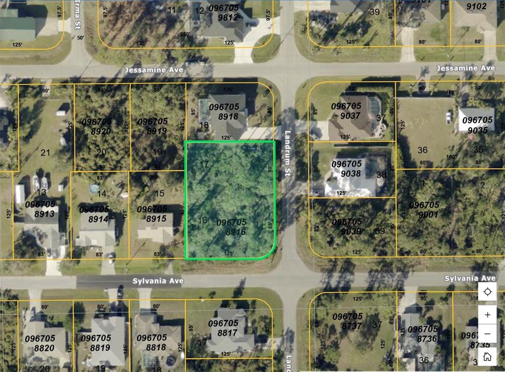 This is a satellite map showing a vacant lot highlighted in green within a neighborhood — SYLVANIA AVENUE, NORTH PORT, FL