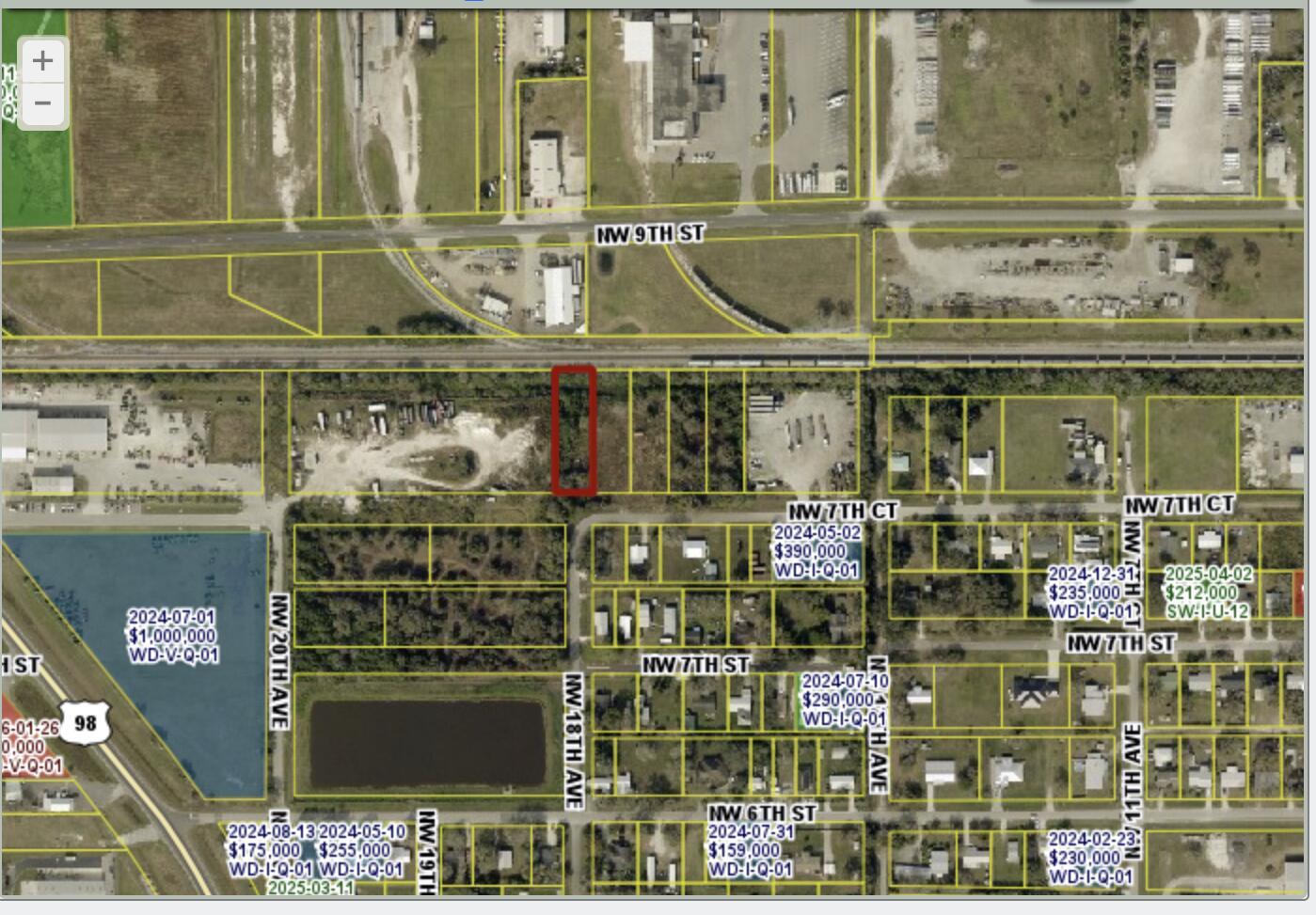 An aerial map shows a highlighted rectangular parcel of land near a railroad track — . NW 7th Court, Okeechobee FL 34972, OKEECHOBEE, FL