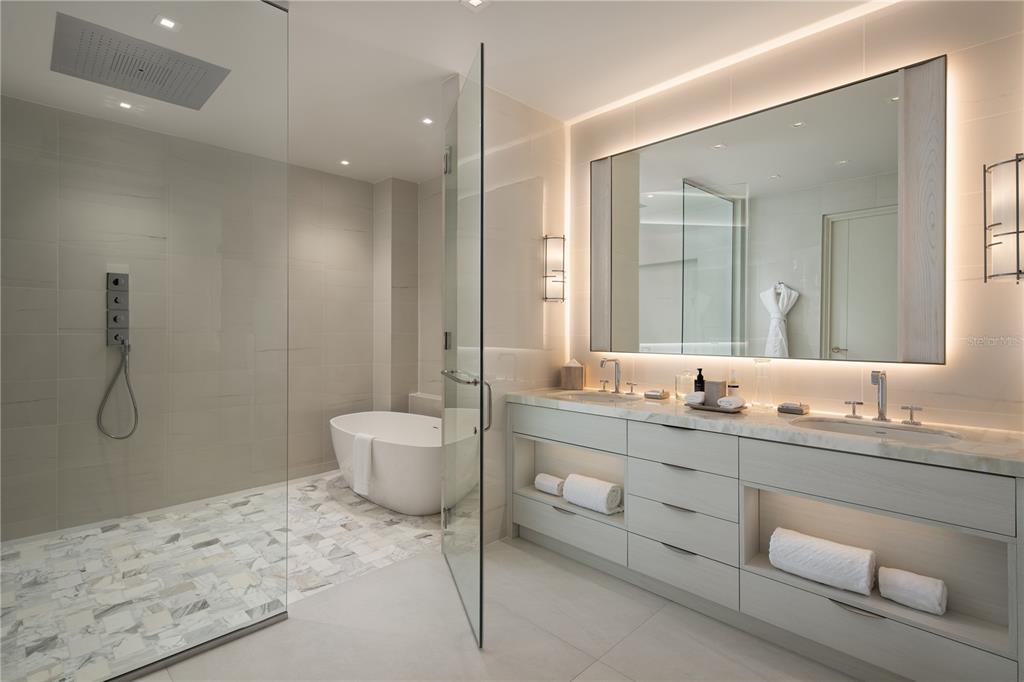 A modern bathroom features a glass-enclosed shower, a freestanding tub, and a double vanity — Ocean Drive PH FOUR SEASONS PRIVATE RESIDENCES UNIT 4501, RIO GRANDE, PR