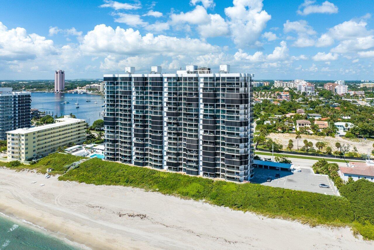 An aerial view of a tall beachfront condominium building with a parking lot and beach — 250 S Ocean Boulevard # 6f, Boca Raton FL 33432, BOCA RATON, FL