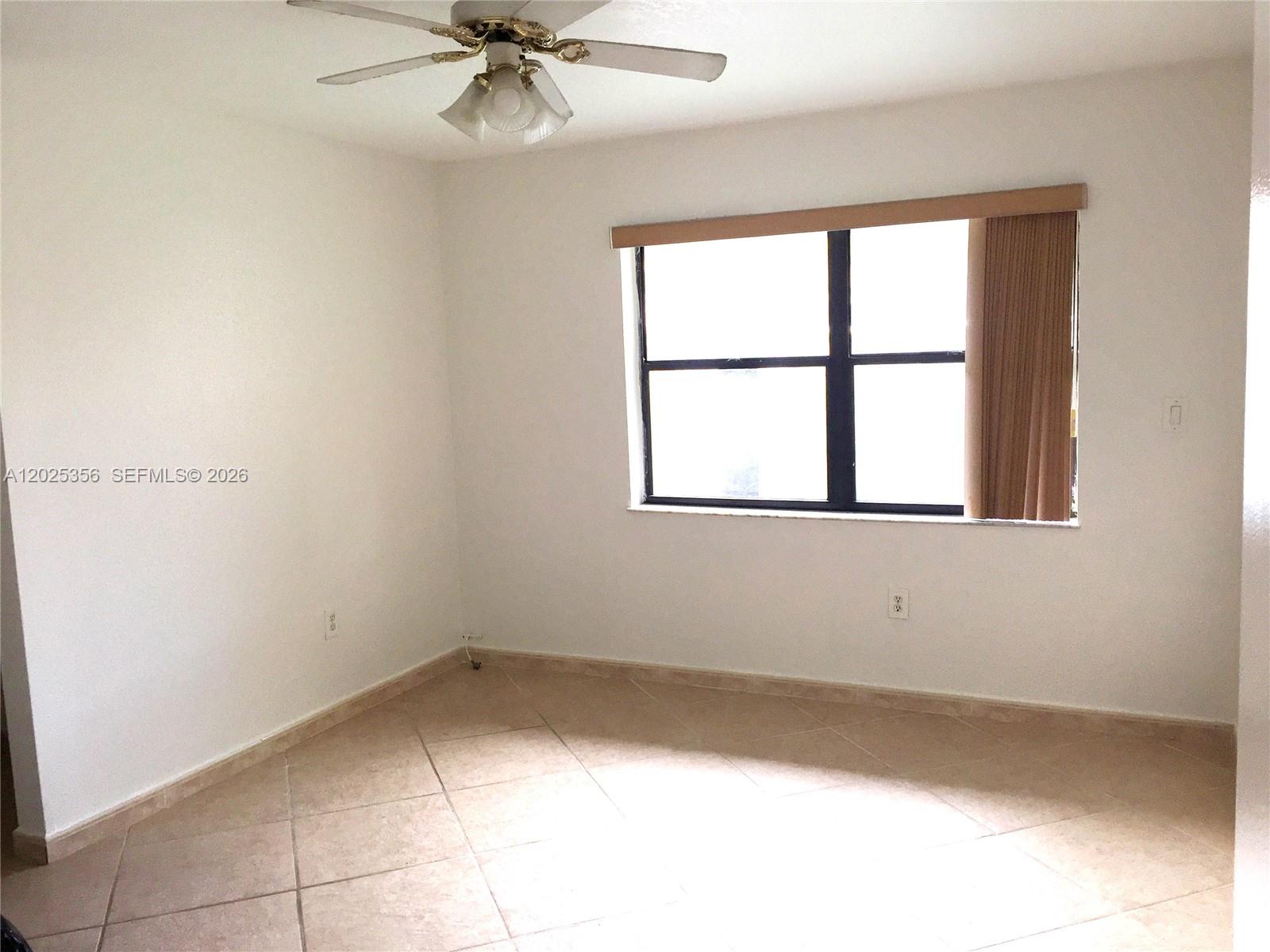 A closet features light wood shelving, a hanging rod, and a stack of five drawers — 15570 SW 76th Ln # 9, Miami FL 33193, MIAMI, FL