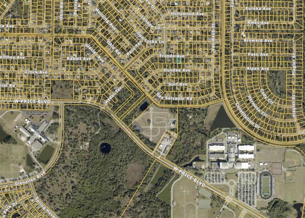 This is a map showing residential streets, undeveloped land, and a school complex — FRONDA AVENUE, NORTH PORT, FL
