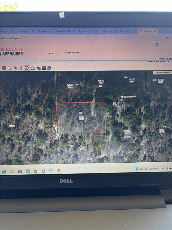 This is a digital map showing a highlighted land parcel on a computer screen — 3726 W SPOON WOOD COURT, DUNNELLON, FL