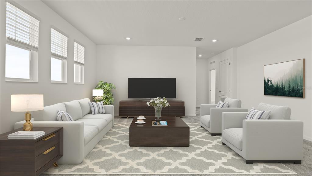 This is a digital rendering of a living room featuring a sofa, armchairs, and television — 3180 NAMASTE DRIVE, CLERMONT, FL