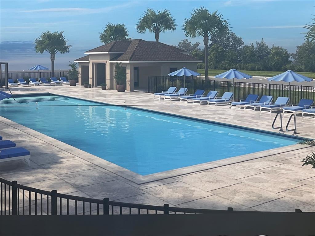 This rendering shows a rectangular swimming pool with lounge chairs and umbrellas on a patio — 482 WINSOME ALLEY, GROVELAND, FL