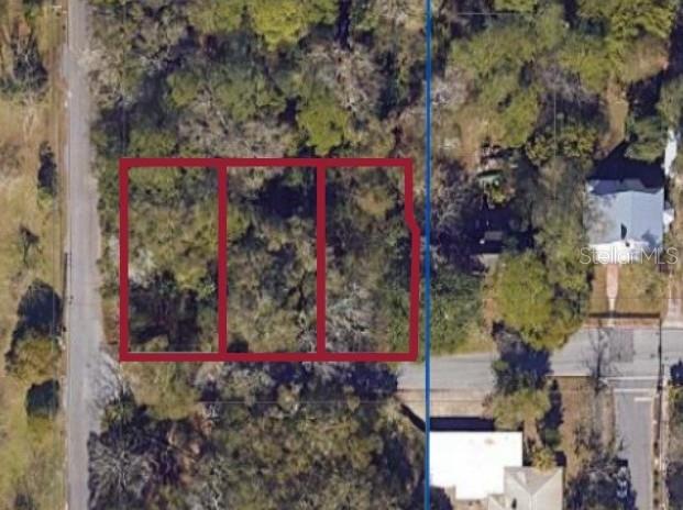 An aerial view shows three adjacent rectangular lots outlined in red within a wooded area — (Parcel 2) 214 NE 13TH AVENUE, GAINESVILLE, FL