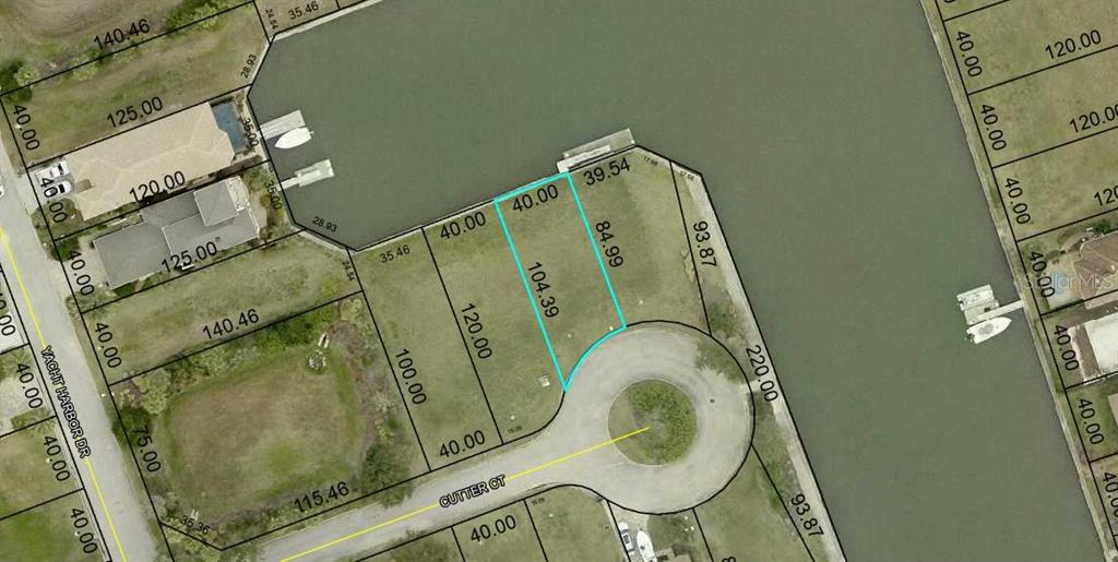 This is a map showing a vacant waterfront residential lot highlighted in blue — 10 CUTTER COURT, PALM COAST, FL