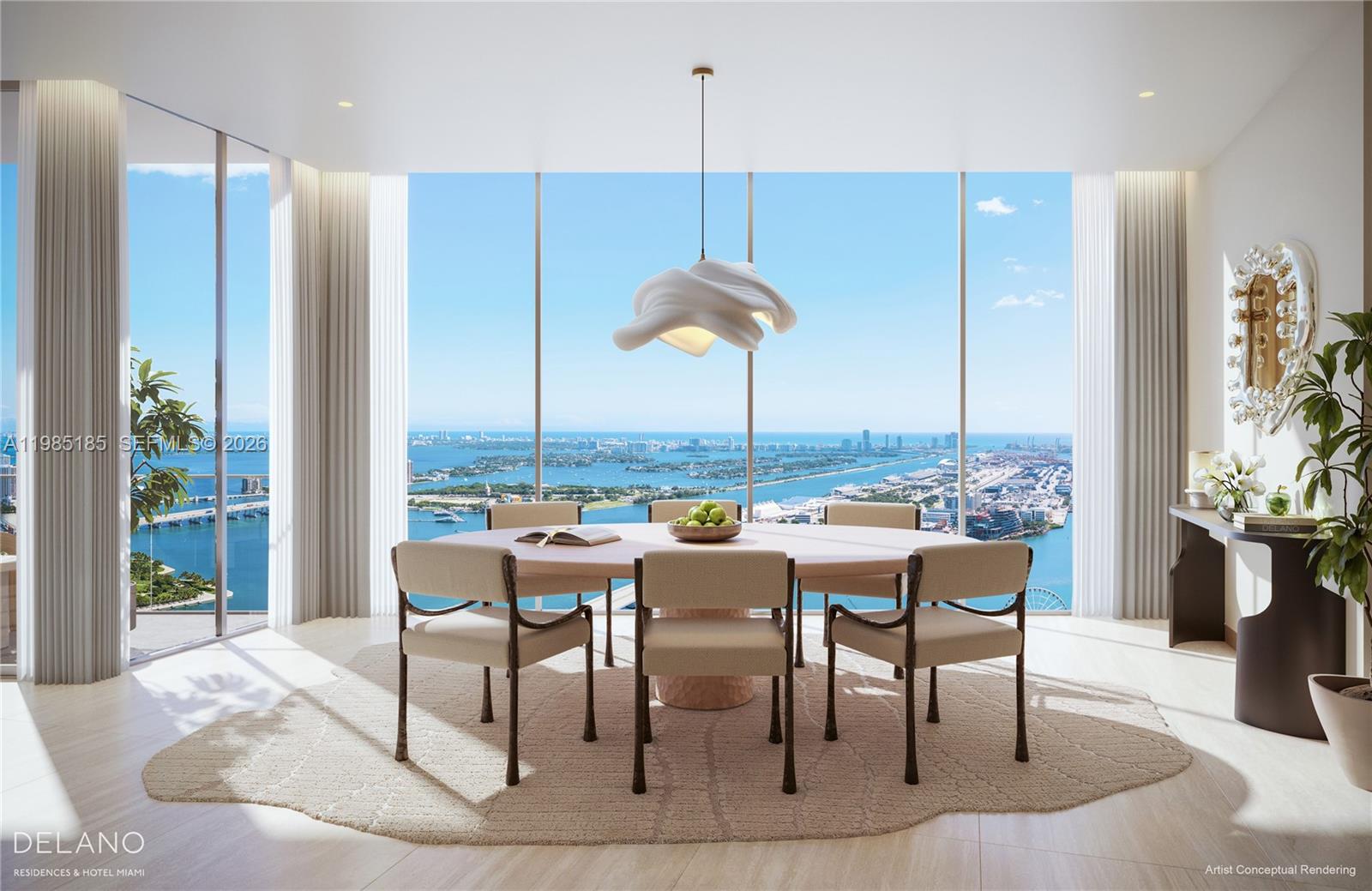 This artist conceptual rendering shows a dining room with floor-to-ceiling windows overlooking a coastal city — 400 Biscayne Blvd # 5703, Miami FL 33132, MIAMI, FL