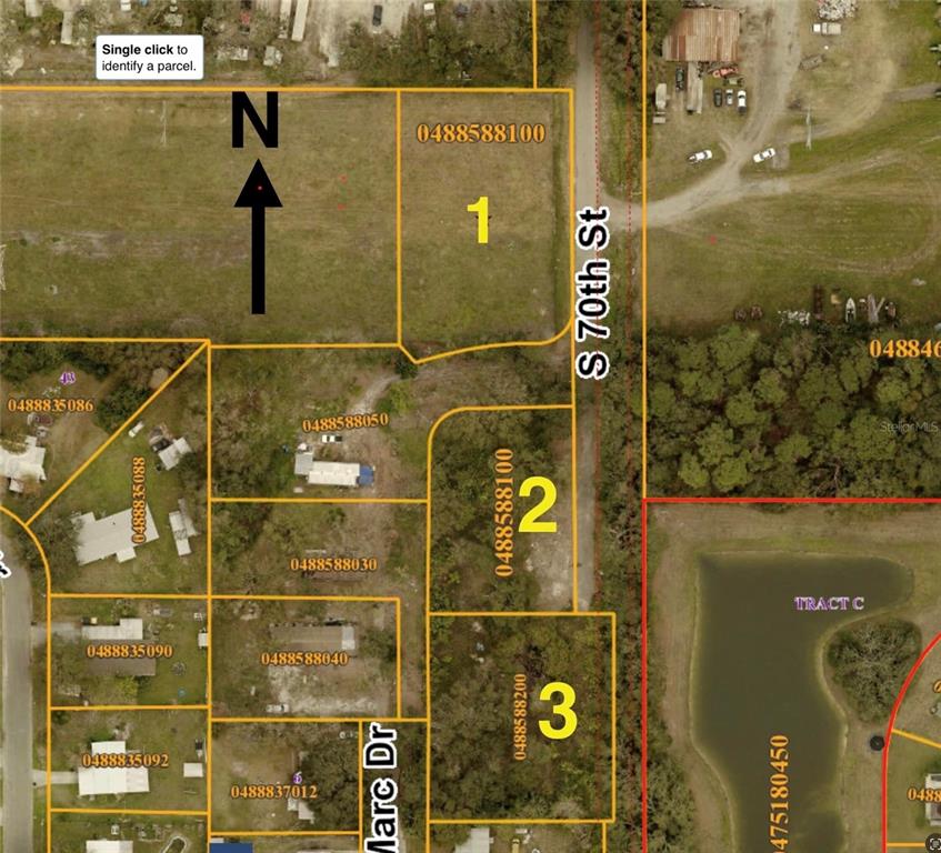 This is a map showing three numbered land parcels and surrounding properties — 4411 S 70TH STREET, TAMPA, FL