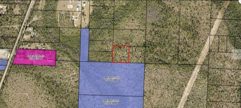 An aerial map shows a highlighted rectangular land parcel surrounded by other plots of land — N/A, FOUNTAIN, FL