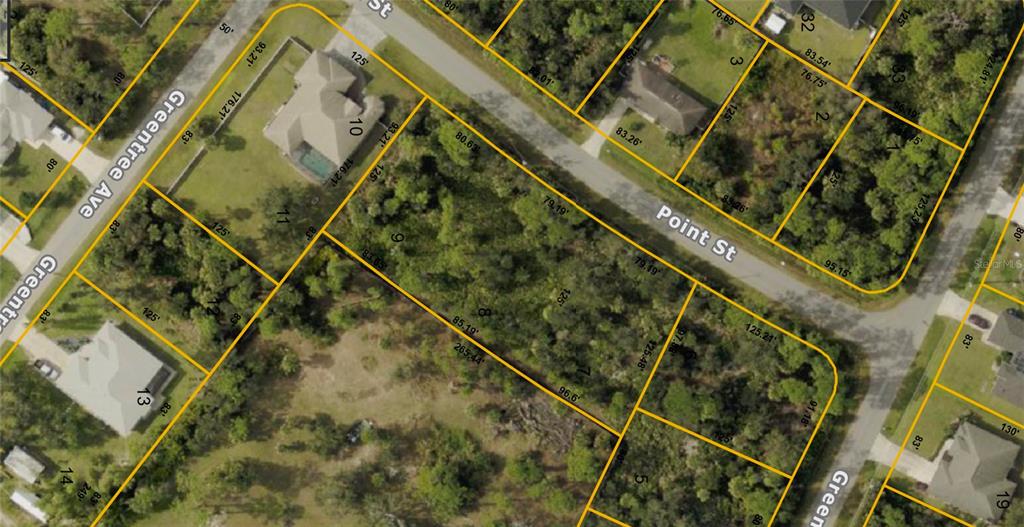 This is an aerial map showing residential lots and street layouts — POINT STREET, NORTH PORT, FL