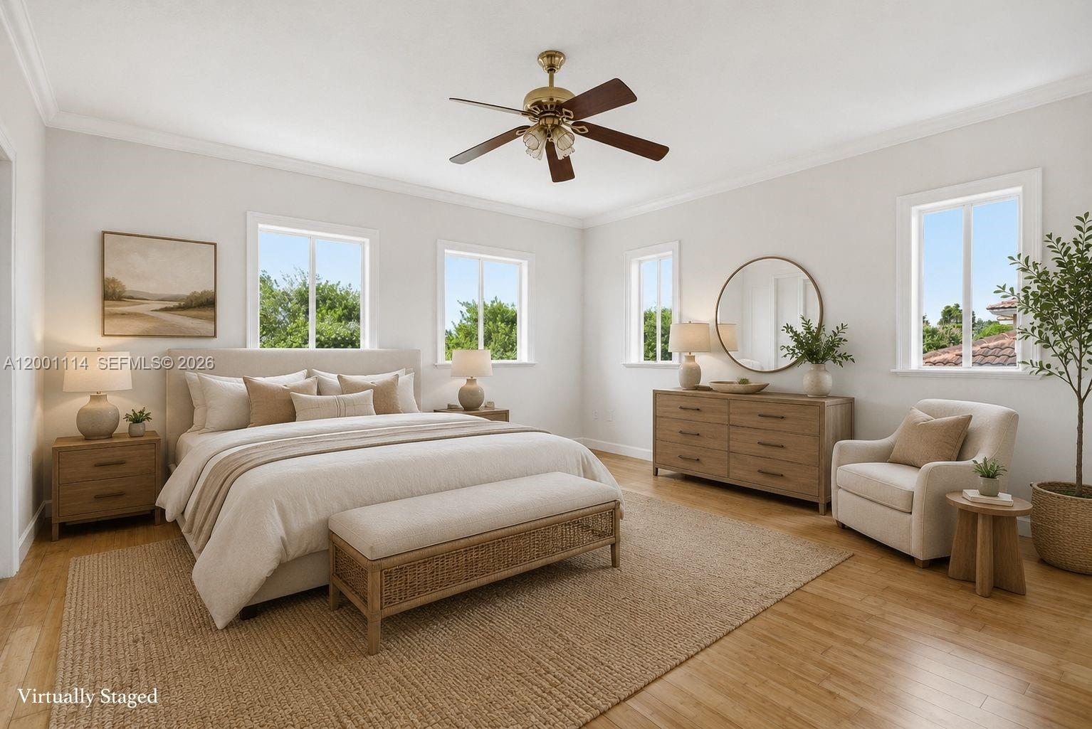 This virtually staged bedroom features a bed, dresser, armchair, and ceiling fan on hardwood floors — 13474 SW 124th Ave Rd, Miami FL 33186, MIAMI, FL