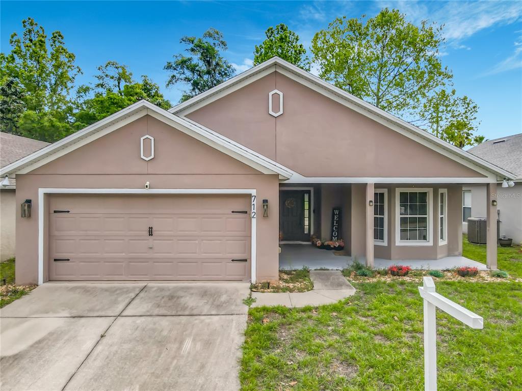 712 SPRING CAVERN AVENUE, ORANGE CITY, FL — photo 2 of 30