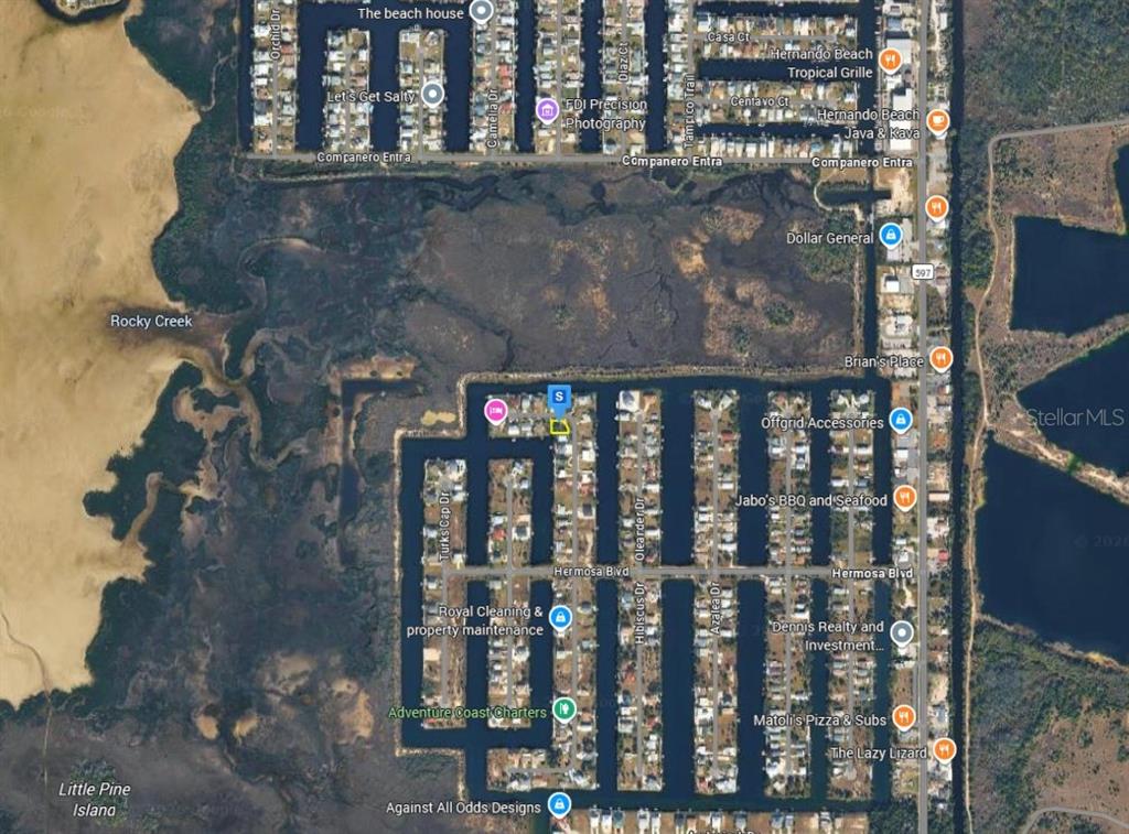 This is a satellite map view of a residential canal community in Hernando Beach, Florida — 3451 CRAPE MYRTLE DRIVE, HERNANDO BEACH, FL