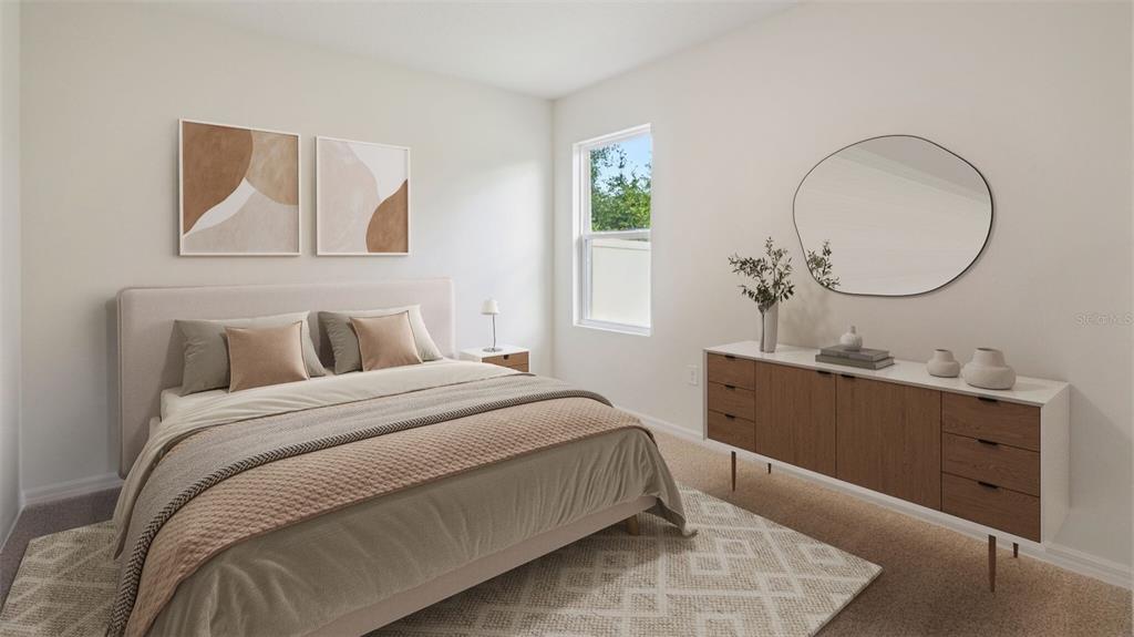 A bedroom features a bed with neutral bedding, a wooden dresser, and a wall mirror — 1348 FOUNTAIN VIEW STREET, ORMOND BEACH, FL