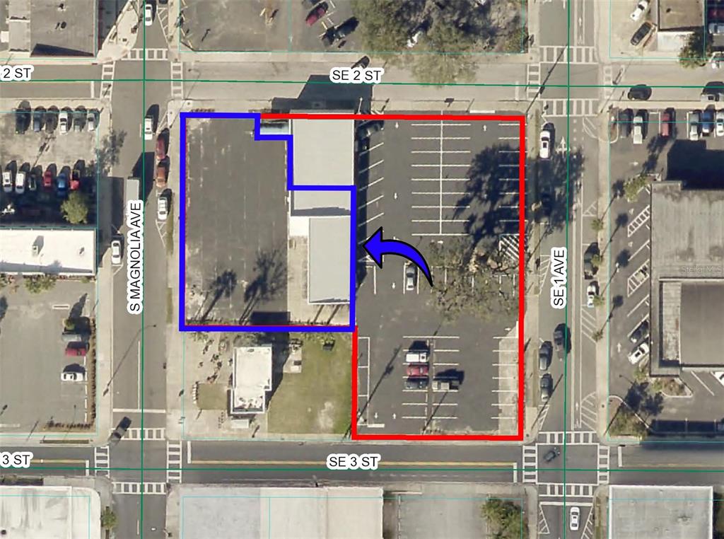 This aerial map shows a commercial building and an adjacent parking lot in an urban area — 205 S MAGNOLIA AVENUE, OCALA, FL