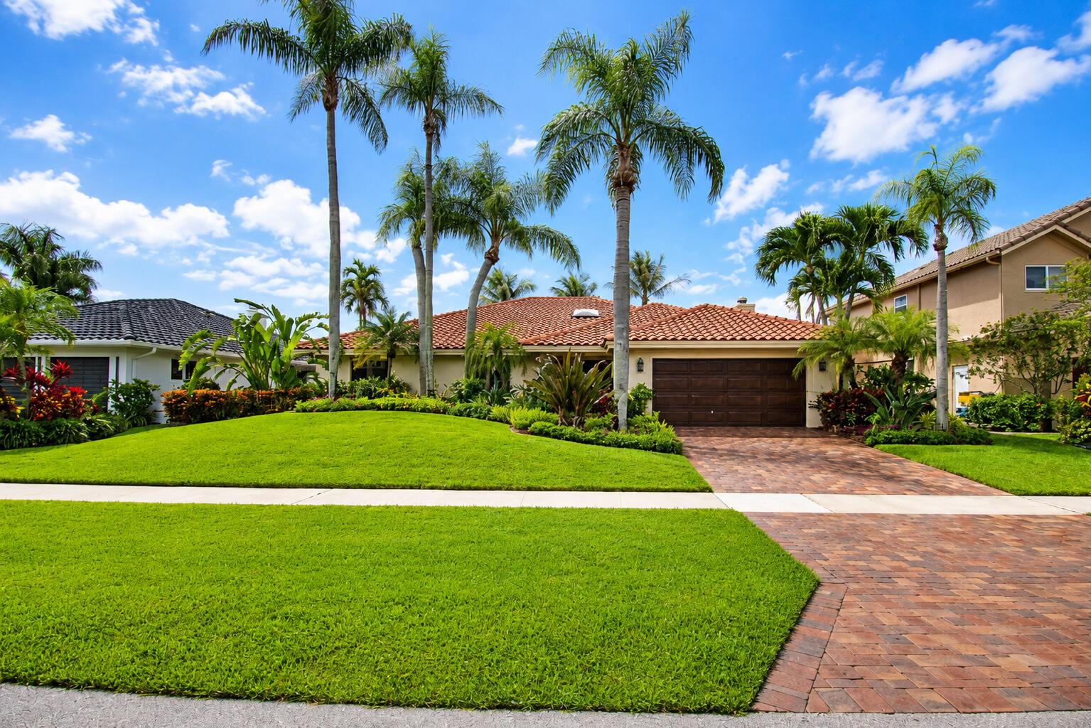 A single-story house with a tile roof, palm trees, and a paved driveway — 7838 Tennyson Court, Boca Raton FL 33433, BOCA RATON, FL
