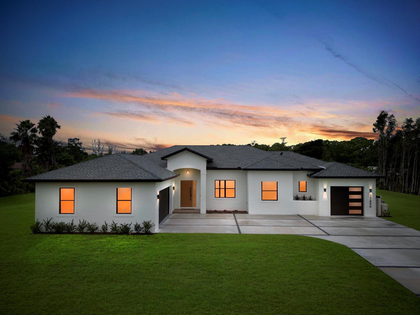 A backyard patio features a swimming pool with a safety fence and outdoor lounge furniture — 17436 71st Lane N, Loxahatchee FL 33470, LOXAHATCHEE, FL