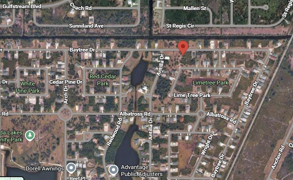 This is a satellite map view showing residential streets, parks, and a marked property location — 277 BAYTREE DRIVE, ROTONDA WEST, FL