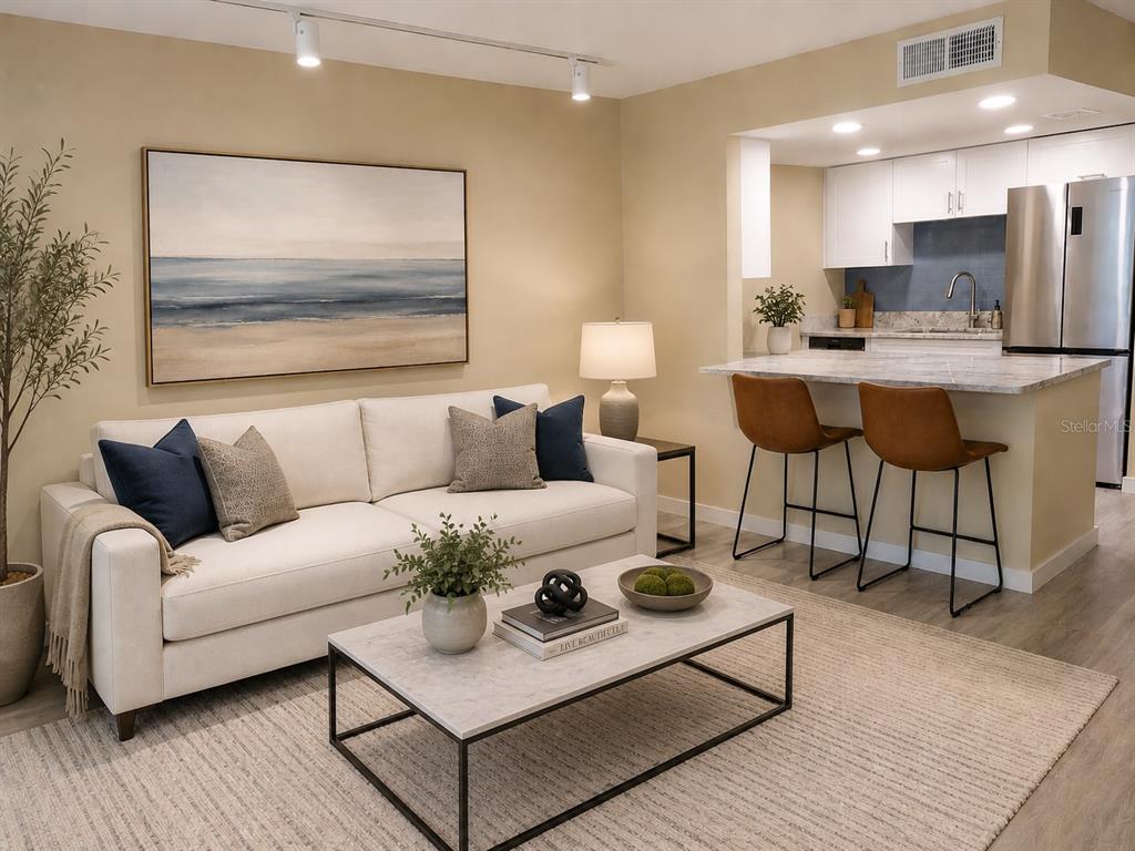 A covered outdoor walkway features a gray concrete floor, white railings, and a numbered door — 9715 HARRELL AVENUE UNIT 39, TREASURE ISLAND, FL