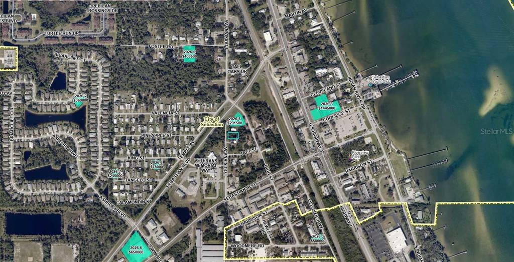 This is an aerial map showing property locations and street names in a coastal area — 828 LOUISIANA AVENUE, SEBASTIAN, FL