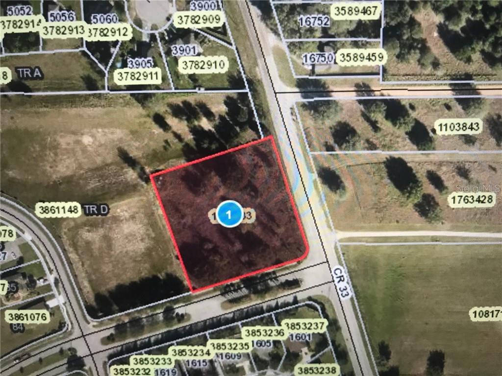This is a map showing a vacant, rectangular plot of land adjacent to a road — CORNER OF CR 33 AND CENTENNIAL PKWY, MASCOTTE, FL