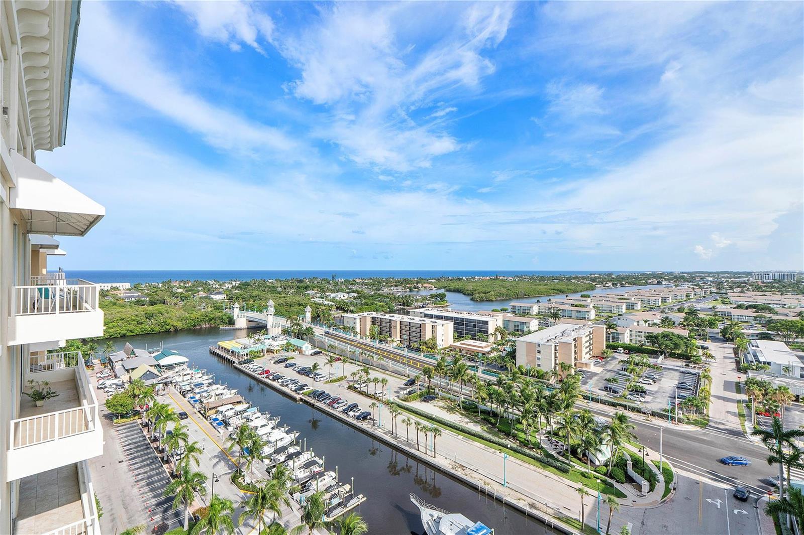 An elevated view shows a marina, a bridge, and residential buildings near the ocean — 625 Casa Loma Boulevard # 1608, Boynton Beach FL 33435, BOYNTON BEACH, FL
