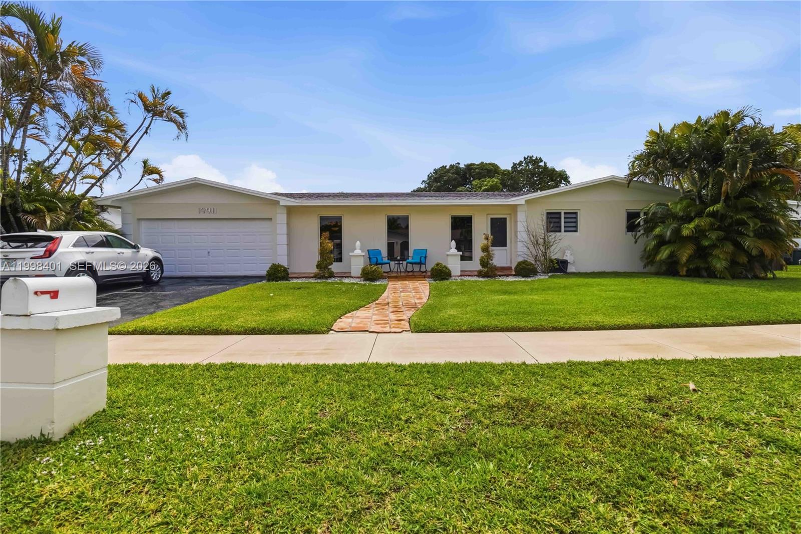 An aerial view shows a house with a swimming pool on a trapezoidal lot — 19911 SW 84th Ave, Cutler Bay FL 33189, CUTLER BAY, FL