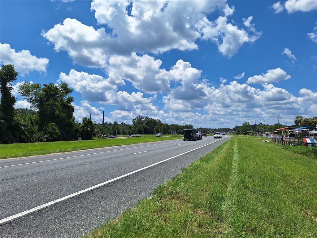 A view of a multi-lane highway with vehicles under a bright, cloudy blue sky — TBD SE HWY. 19, OLD TOWN, FL