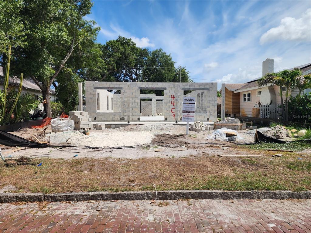 A construction site shows a concrete block wall frame for a new house — 4409 2ND AVENUE N, ST PETERSBURG, FL