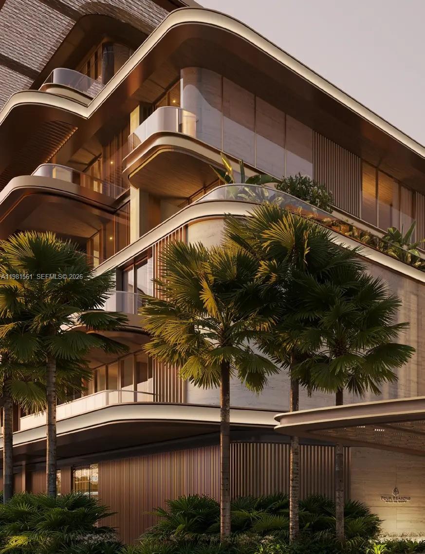 This architectural rendering shows the exterior of a modern building with curved balconies and palm trees — 1st Saadiyat Beach District # 0, Abu Dhabi, FL