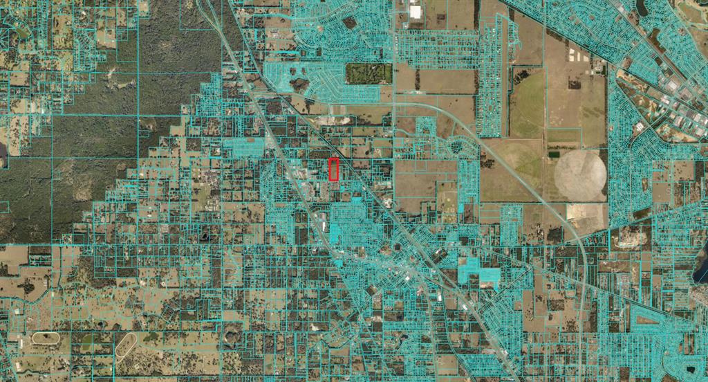 An aerial map shows a highlighted rectangular property parcel surrounded by residential and rural land — 00 SE 102 PLACE, BELLEVIEW, FL
