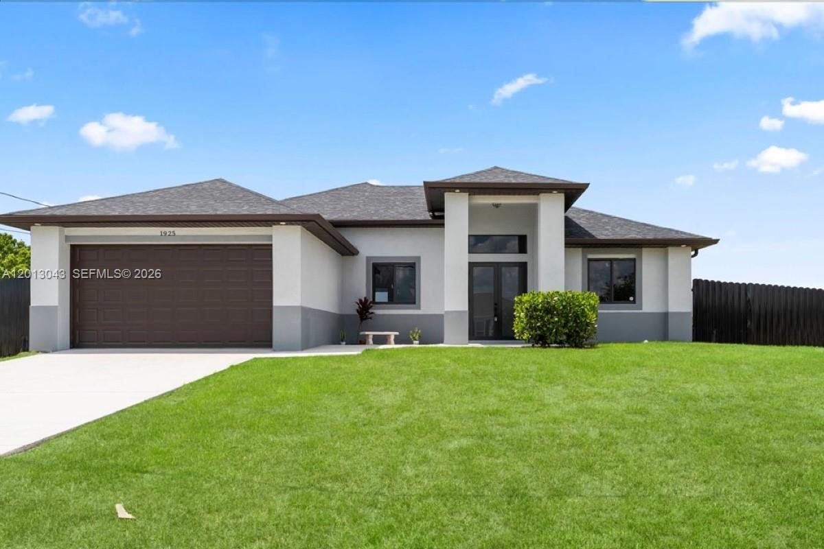 A single-story house with a brown garage door, gray exterior trim, and a green lawn — 1925 NW 15TH TER, Cape Coral FL 33993, CAPE CORAL, FL