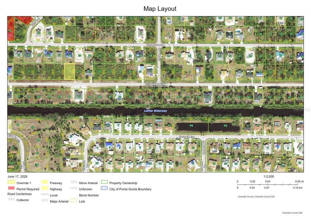 This is a map layout showing residential lots, streets, and waterways in a neighborhood — 13216 FORESMAN BOULEVARD, PORT CHARLOTTE, FL