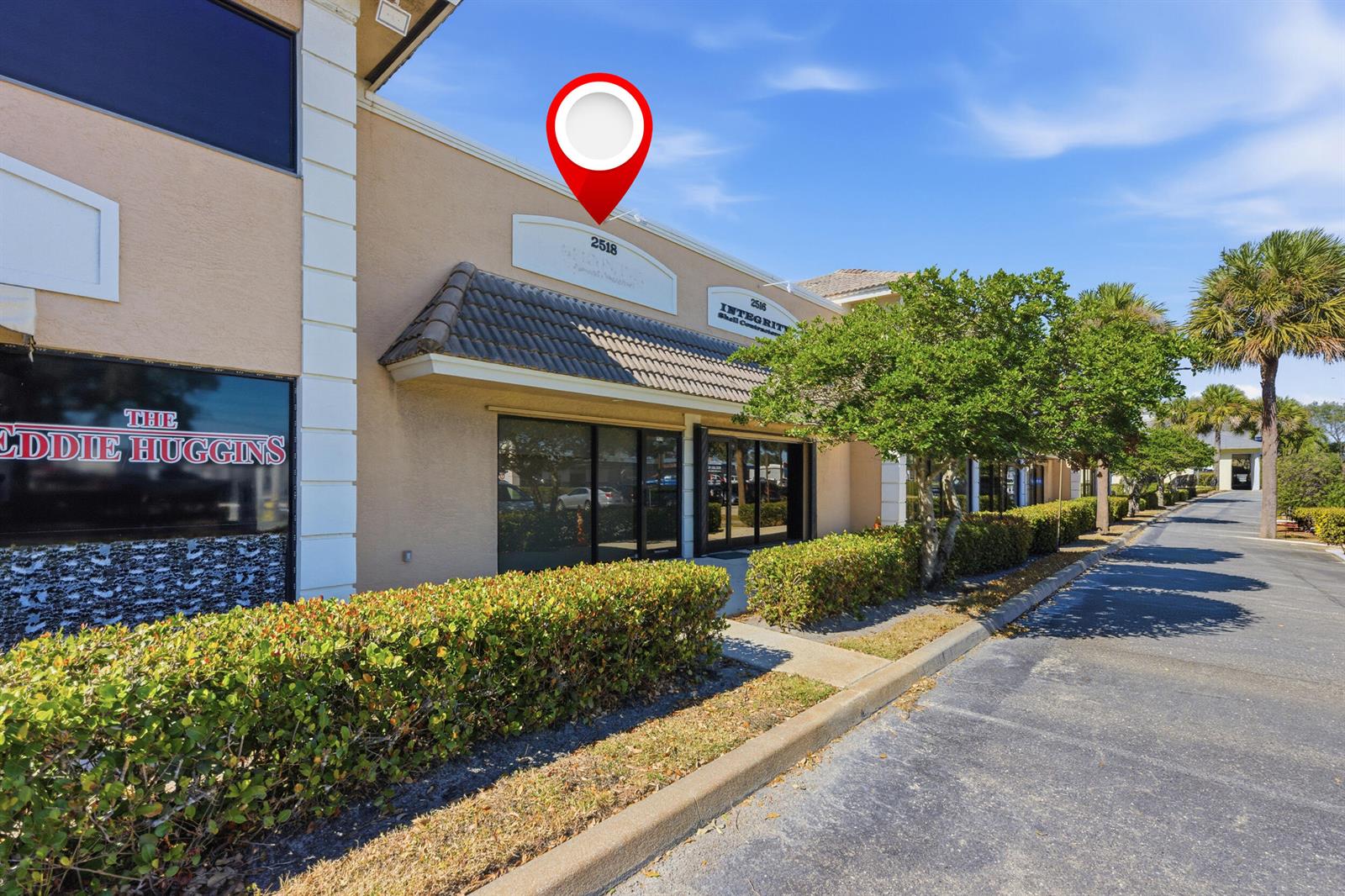 An exterior view of a commercial building with a red location pin above it — 2518 SE Willoughby Boulevard # 2518, Stuart FL 34994, STUART, FL