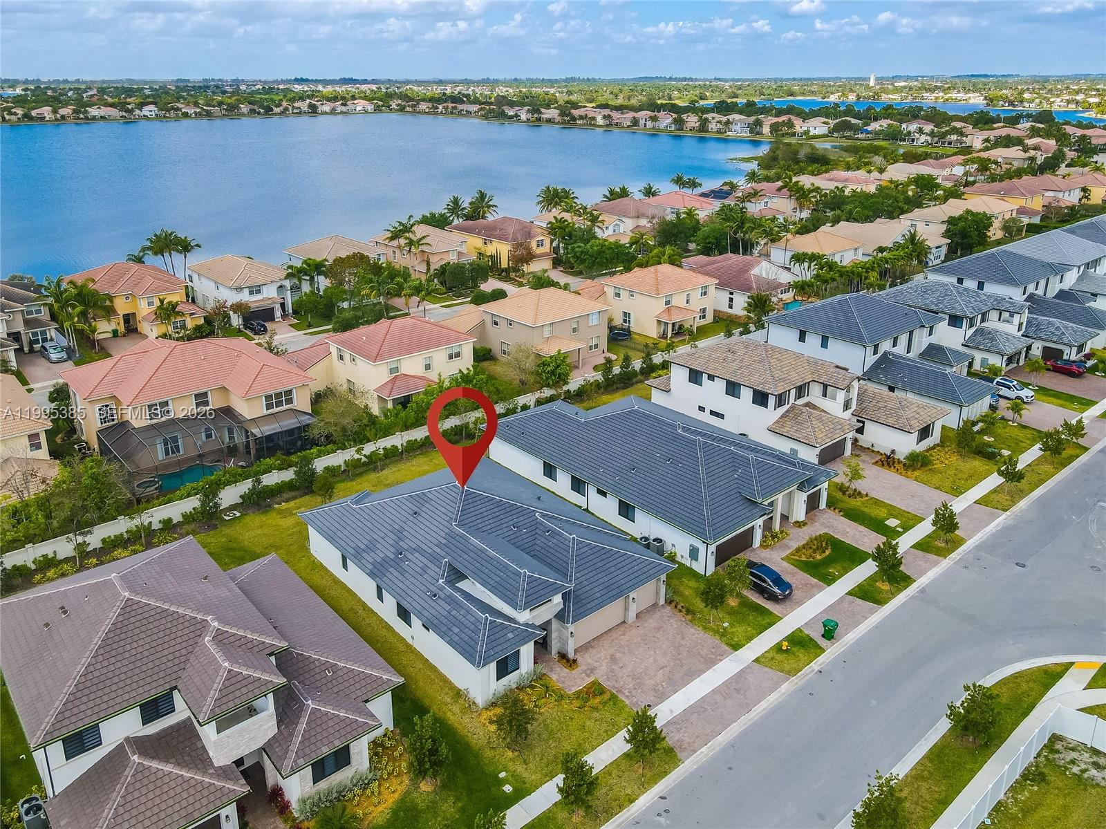 An aerial view shows a single-story house with a dark tiled roof and driveway — 4528 SW 178th Ave, Miramar FL 33029, MIRAMAR, FL