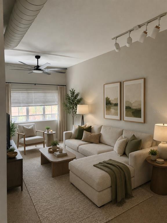 A living room features a beige sectional sofa, a ceiling fan, and track lighting — 2411 W HORATIO STREET UNIT 538, TAMPA, FL
