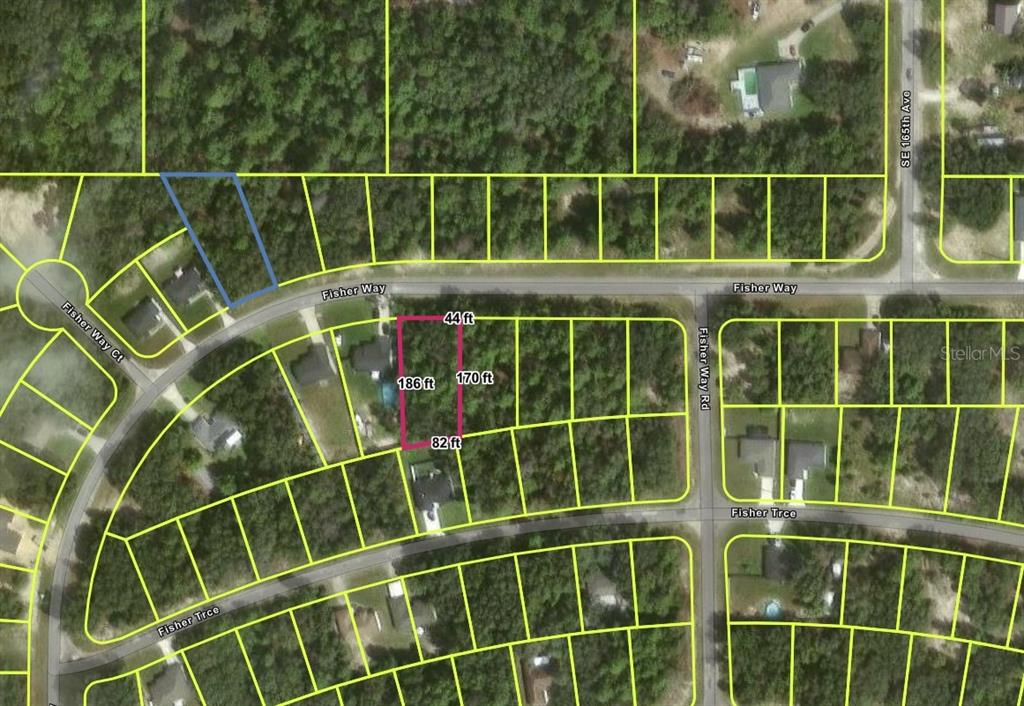 This is an aerial map showing a highlighted residential lot with property dimensions — TBD FISHER WAY, OCKLAWAHA, FL