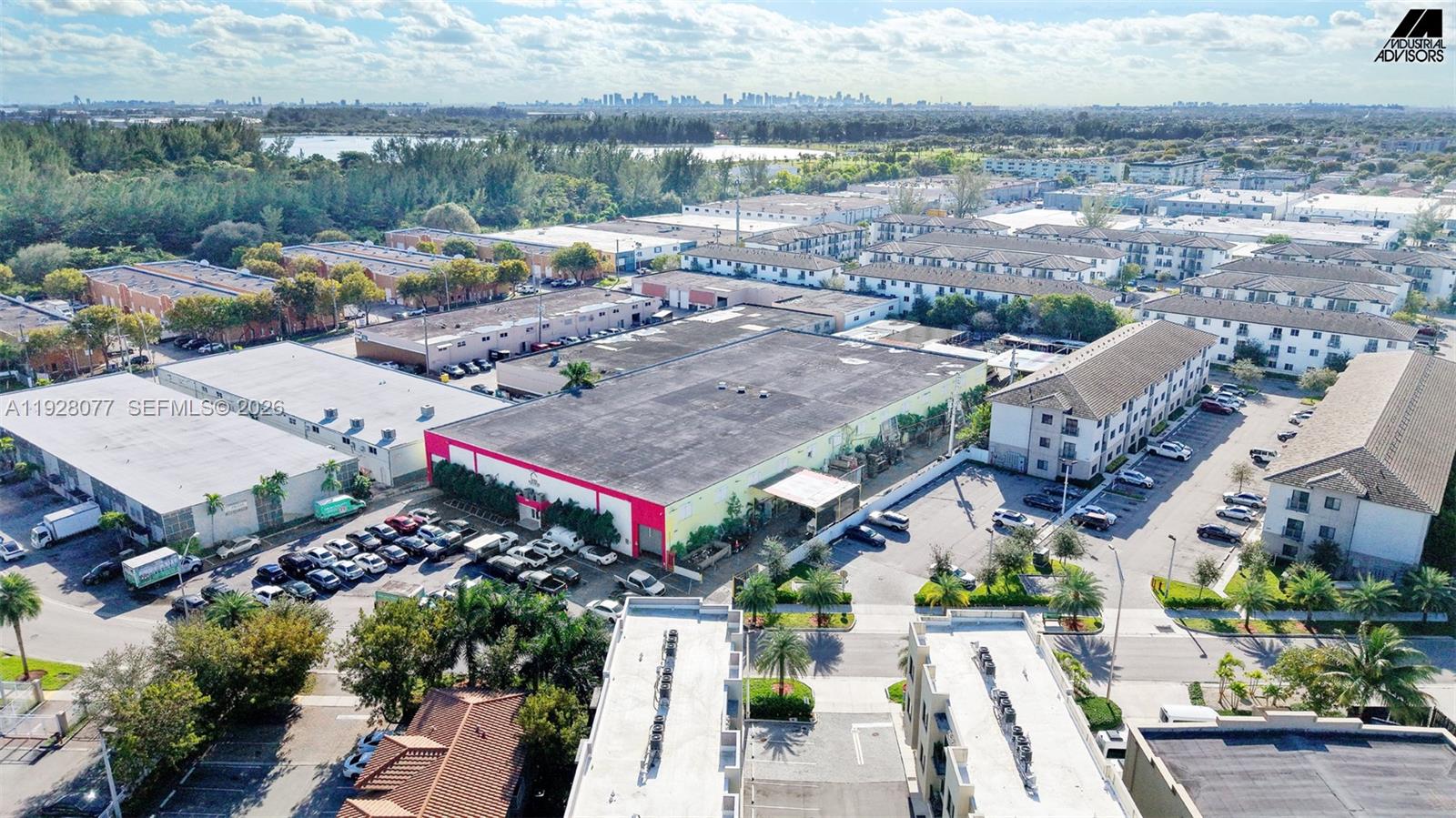 An aerial view shows a large industrial warehouse building surrounded by parking lots and residential complexes — 290 W 78th Rd, Hialeah FL 33014, HIALEAH, FL