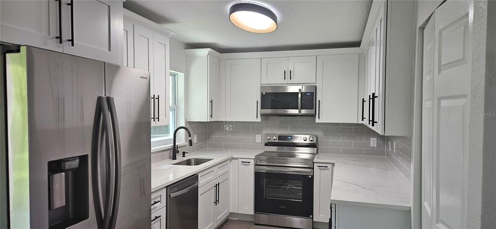 501 LOOMIS TRAIL, DAYTONA BEACH, FL — photo 3 of 23